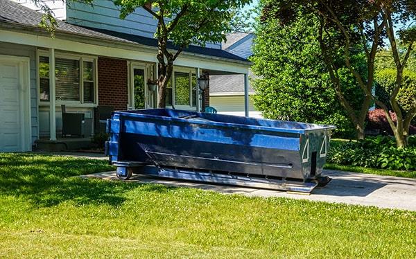 the waste in a residential dumpster is taken to a land fill or recycling center for disposal or processing